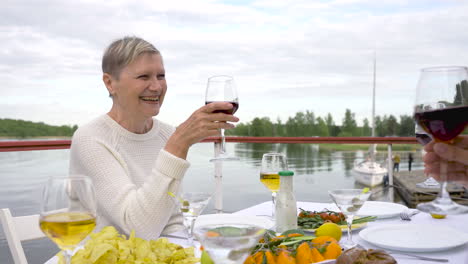 a group of senior people toasting 1