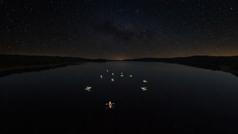 a serene nighttime kayaking venture: gliding through a starlit lake under a canopy of stars with reflective waters and luminous kayaks