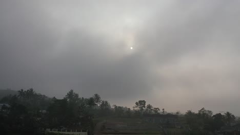 misty sunrise over a rural village