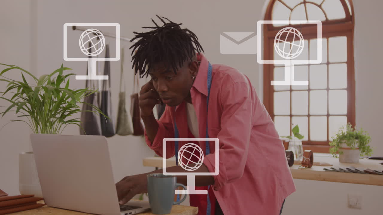 Animation of screens with globes icons over african american man using smartphone