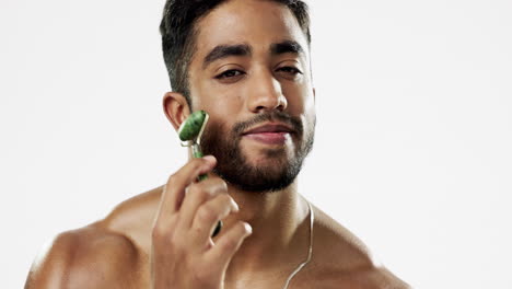 face, man and facial roller for skincare