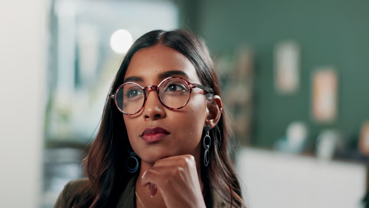 Portrait of a thoughtful woman wearing glasses