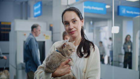 woman with cat at airport security
