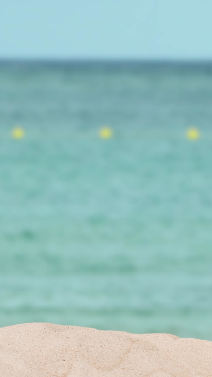 Vertical Video Summer Holiday Concept With Child's Spade On Sandy Beach Against Sea Background