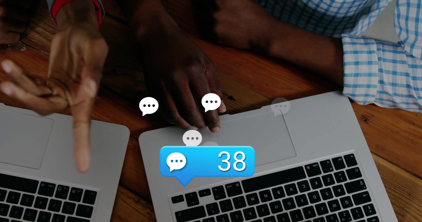 Blue chat bubble appearing, hands pointing and tapping laptops, icons increasing, team responding