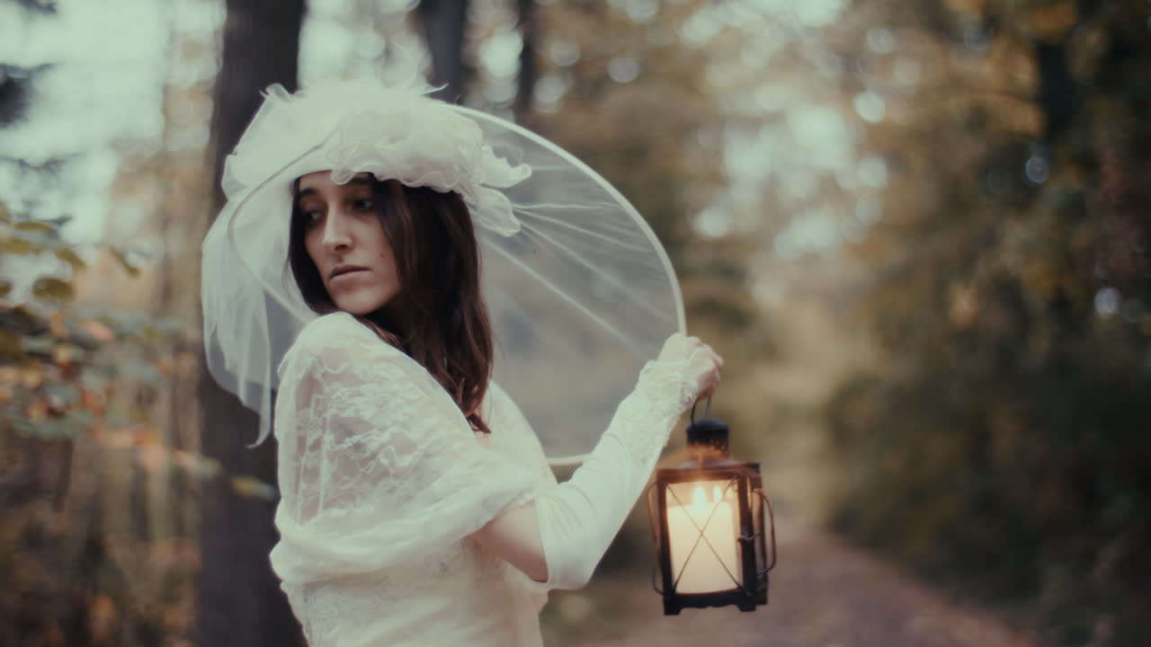Woman in White Dress with Lantern in a Mystical Forest