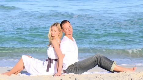 couple relaxing on the beach