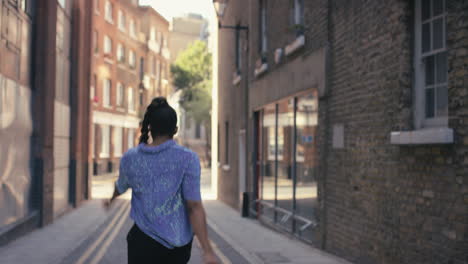 contemporary funky african american woman street dancer dancing freestyle in the city