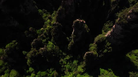 aerial top down shot ascending over karst pillars in yuanjiajie, zhangjiajie national park, china
