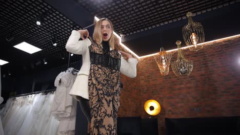woman in a dress in a fashion showroom