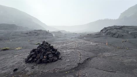 fog filled hawaiian dormant volcano crater in the volcanoes national park