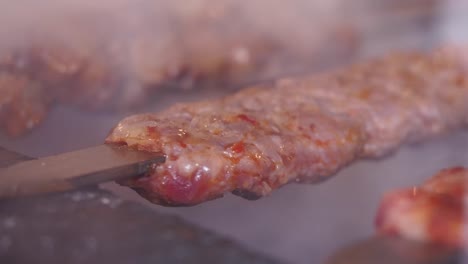 preparing delicious grilled kebabs