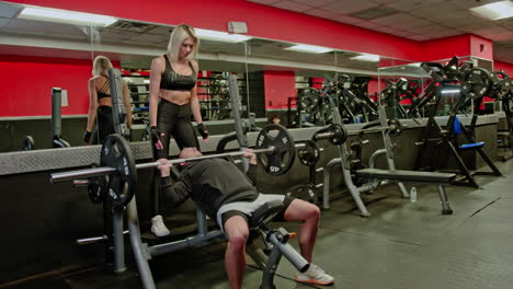 muscular athletes actively training in the modern gym