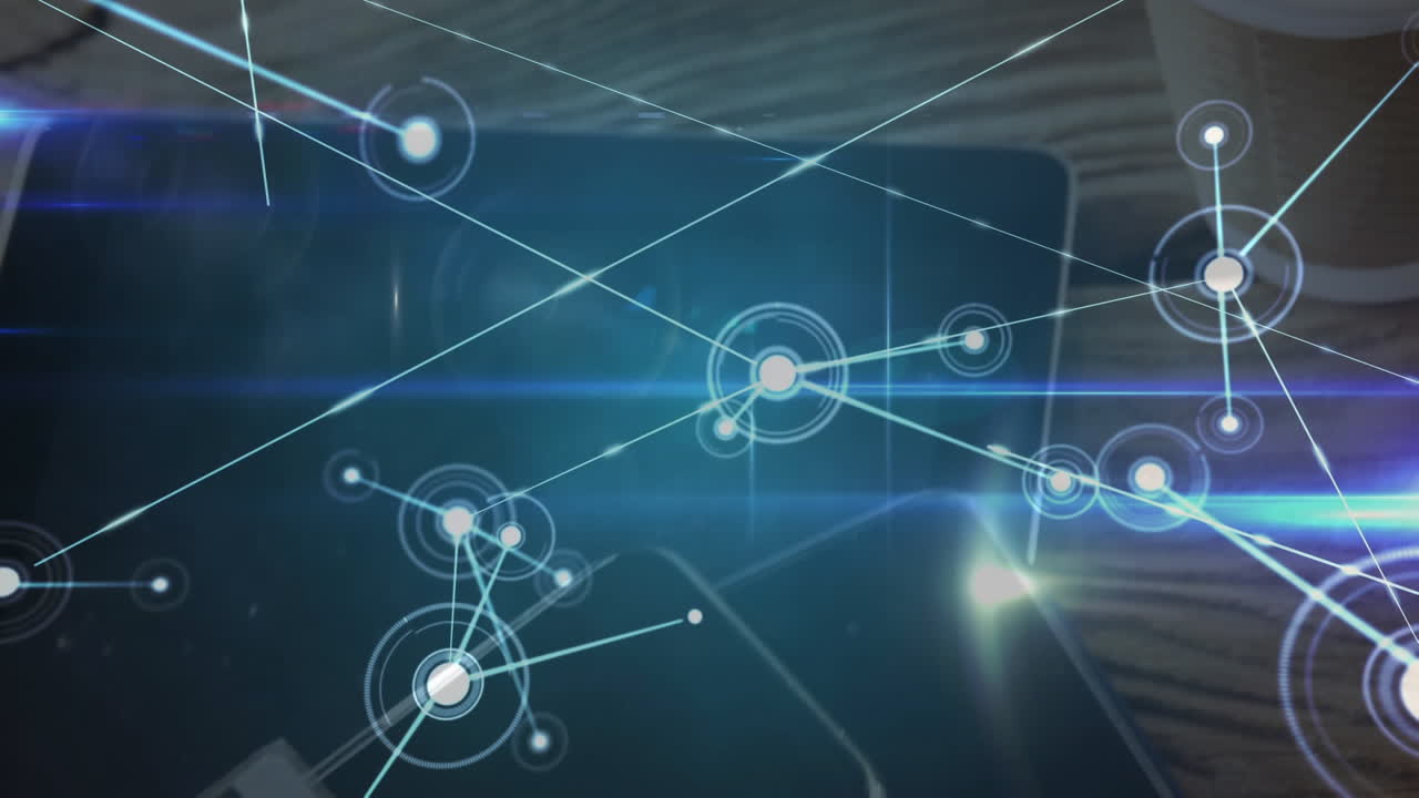 Network of connections against multiple electronic devices on wooden surface