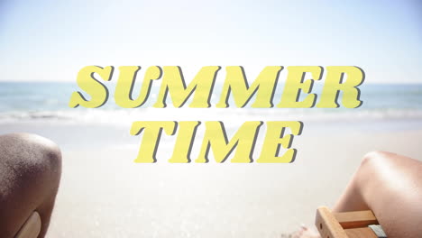 animation of summer time text over diverse couple holding hands on beach