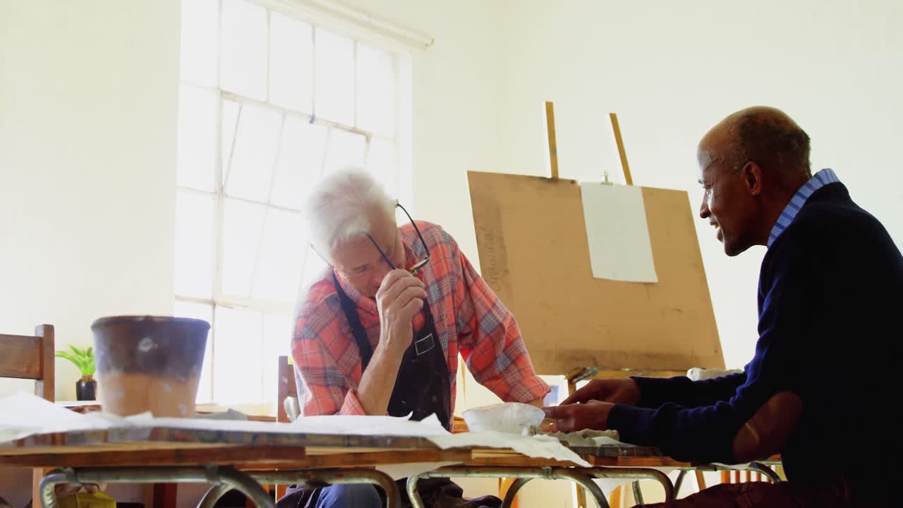 Artist interacting with each other at table 4k