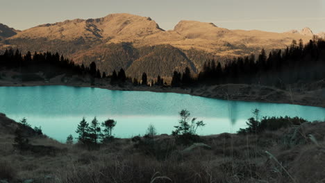 alpine lake with reflection and mountain views