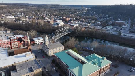 downtown frankfort kentucky the kentucky river and historical building and the singing bridge leadin the the frankfort state capital building aerial dolly