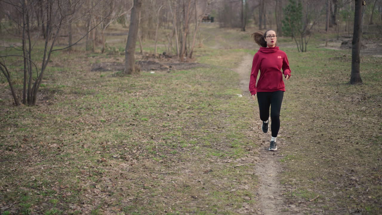 Interval Running With Rhythmic Arm Movement, Narrow Dirt Path Sprint Training Session, Intensive Sprint Exercises Designed For Focused Runners On Confined Dirt Track With Rhythmic Arm Motion