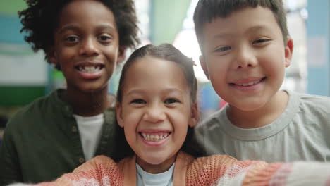 diverse group of smiling school children