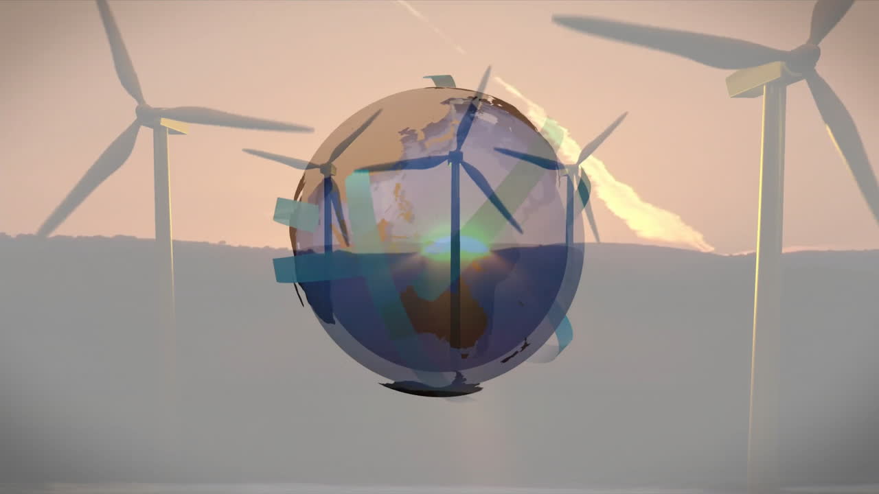 Spinning wind turbines with animation of transparent globe against sunset sky