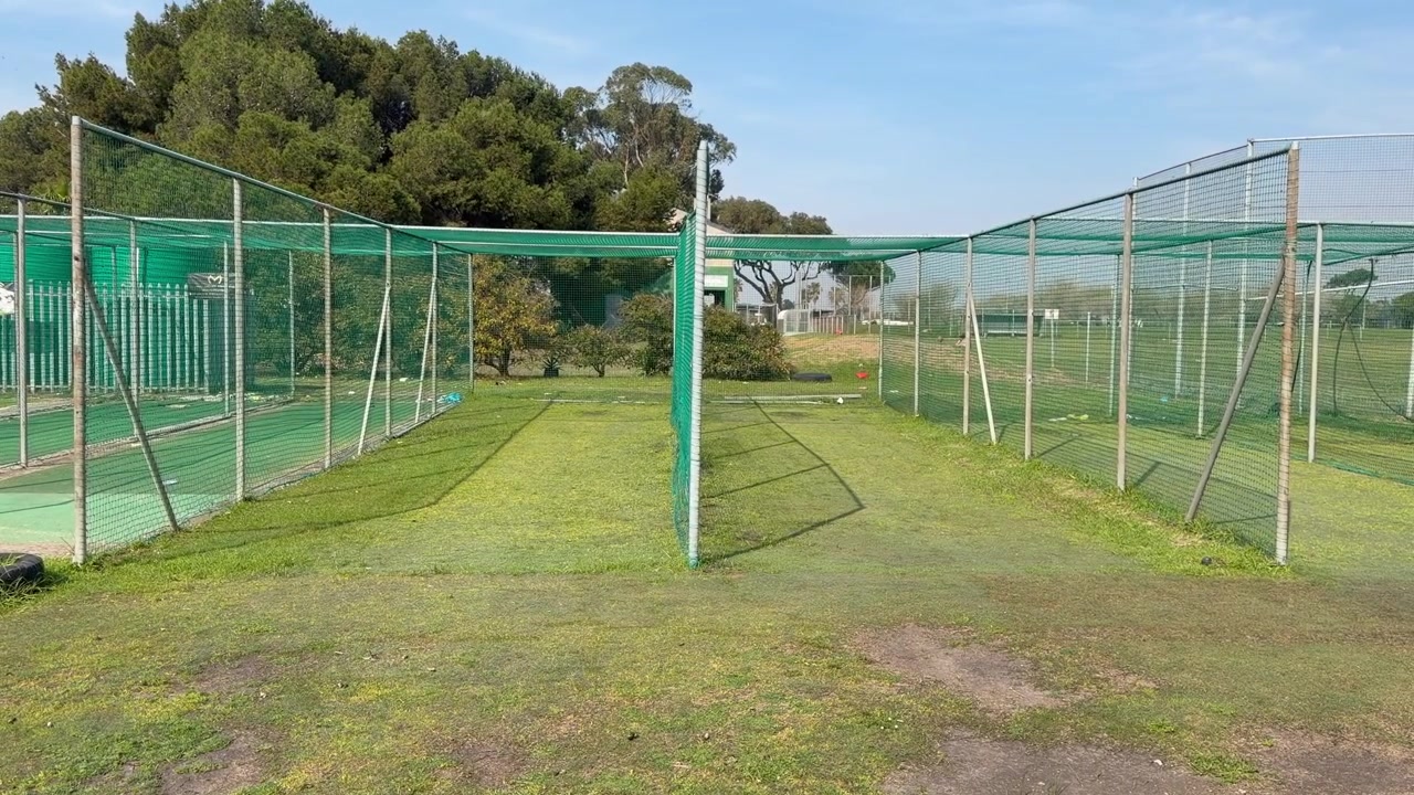 Cricket practice batting nets at a cricket club.