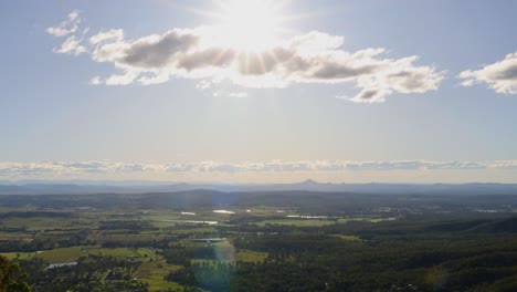 time-lapse of sunrise illuminating a vast landscape