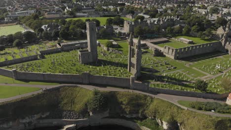 aerial drone view of the st andrews cathedral and cemetery grounds in scotland, uk