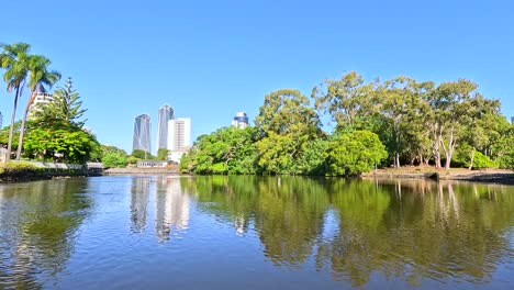 scenic river cruise through lush urban landscape