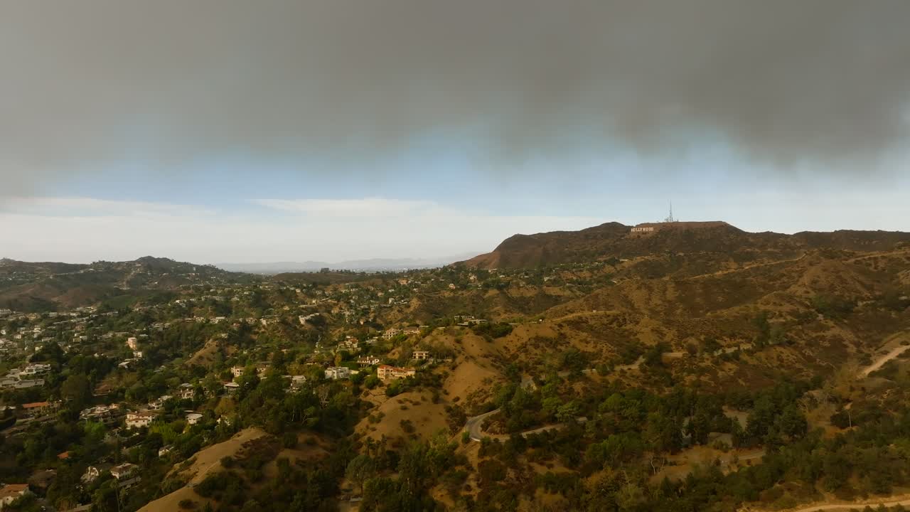 4K aerial of Hollywood Sign during the LA fires in January 2025, Los Angeles, California, USA.