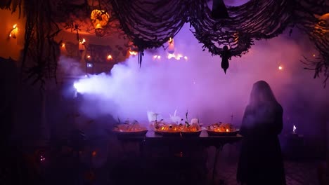 spooky halloween party with fog and decorations