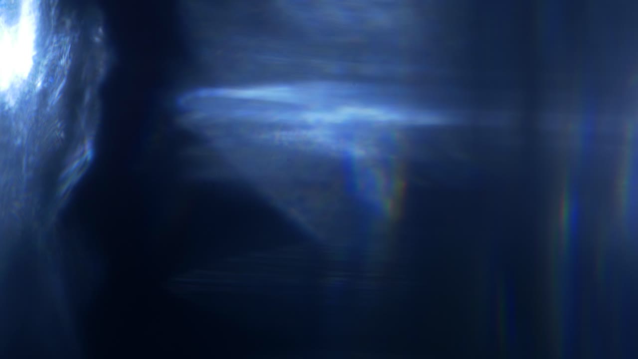Dynamic Blue Light Leaks and Rainbow Lens Flares