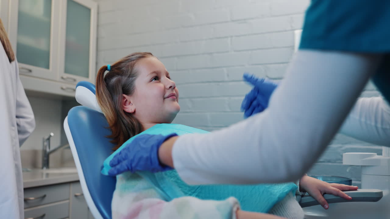 exame dentário com uma criança