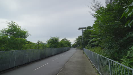 scenic walkway exercise bike path in hong kong on cloudy day