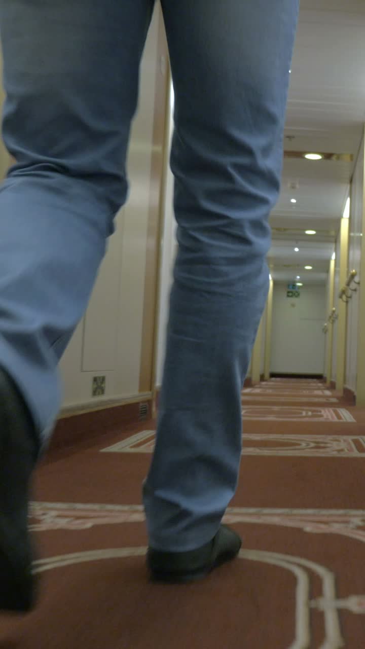 Walking down a hotel hallway
