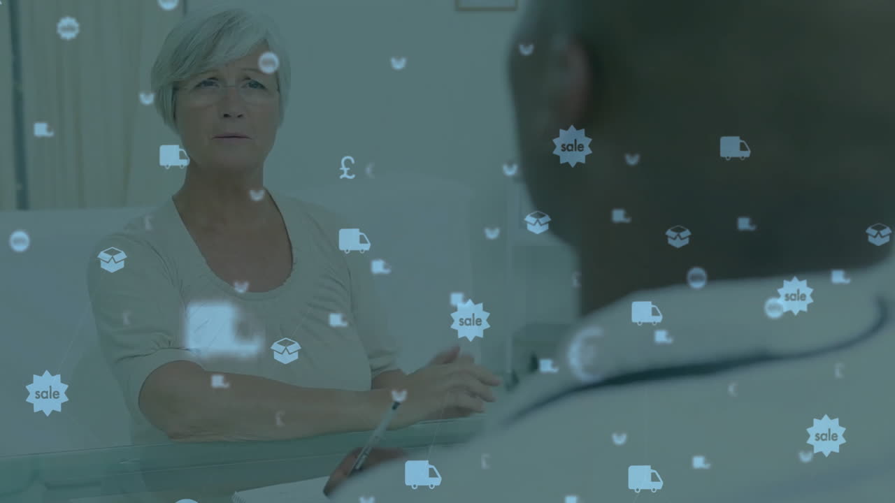 Consultant and client holding business talk at table, showing sale, delivery, package, pound icons