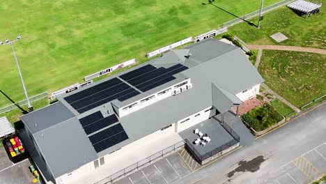 aerial view of a sports building and field