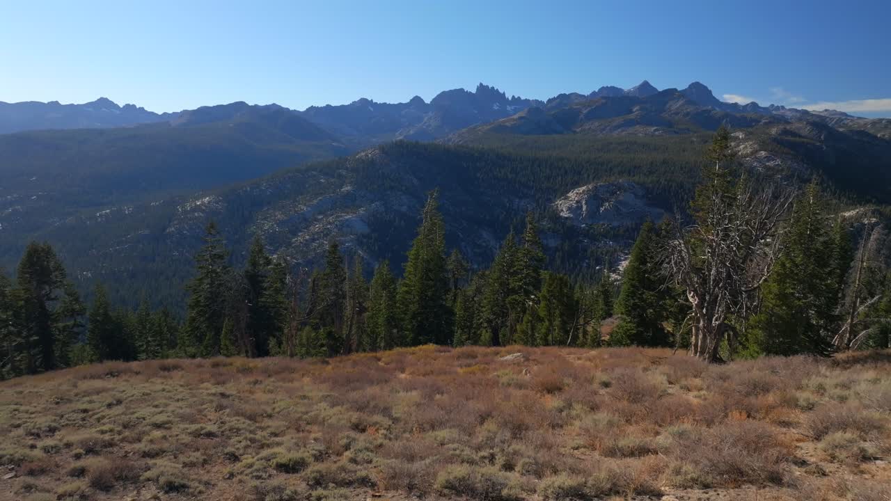 Minarets Vista Mammoth Mountain Lakes aerial drone California Sierras Banner Peak PCT Trail afternoon morning blue sky clouds nature landscape Pacific Crest Trail Yosemite forward motion