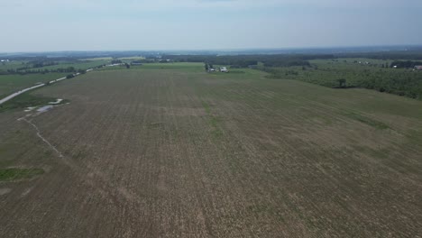 Aerial-View-Over-Vast-Agricultural-Field---drone-shot