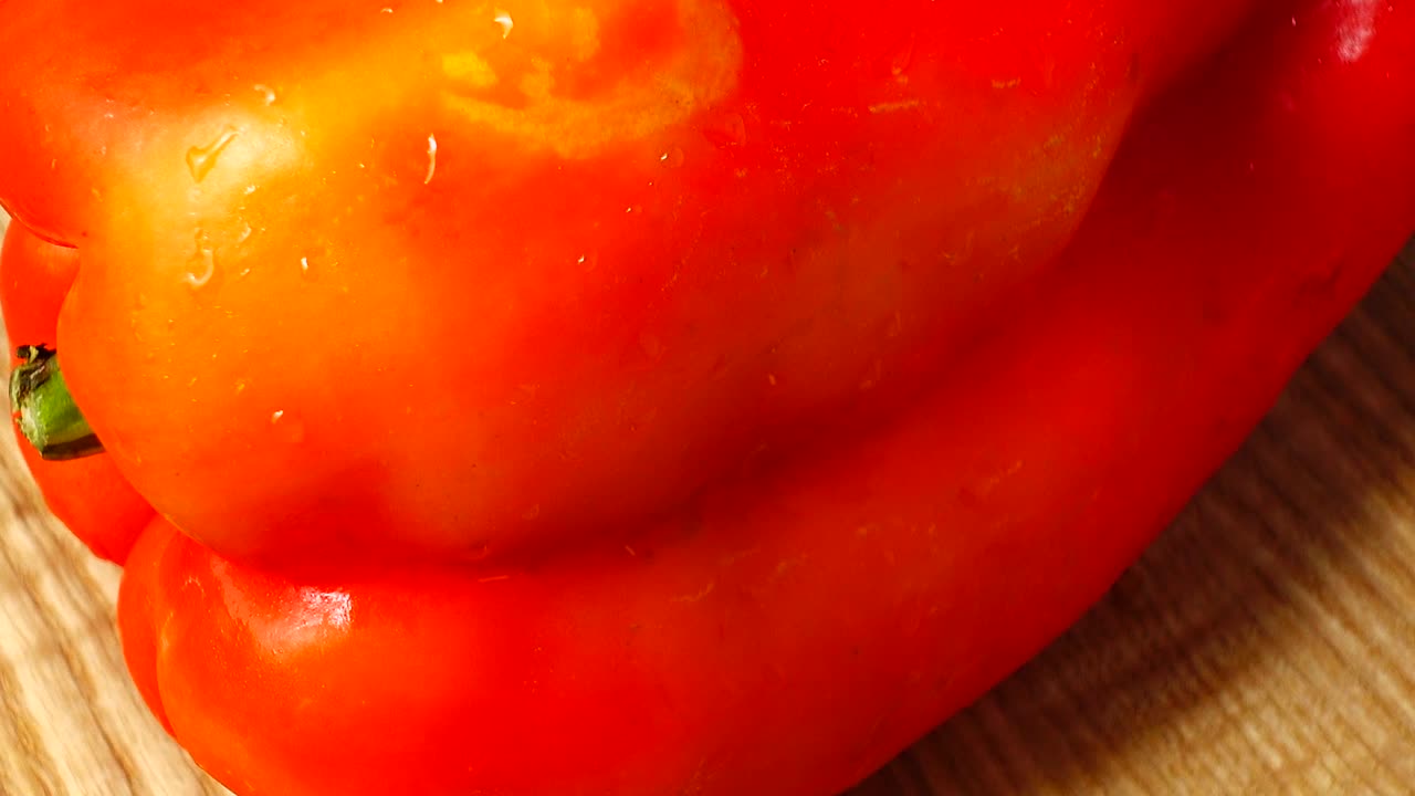 Søt rød paprika. Fotografering i bevegelse