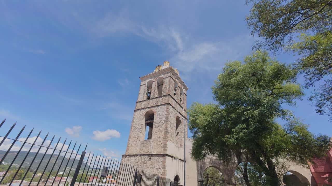 Exterior 4K footage of Tlaxcala’s bullring, showcasing colonial design and urban context