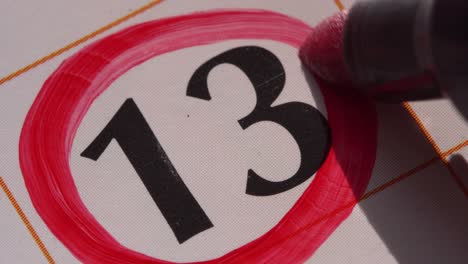 marking the date in the calendar with a red marker