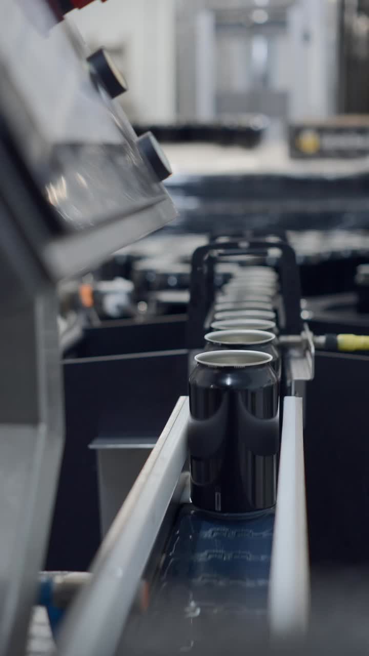 Cans on a Production Line in a Factory