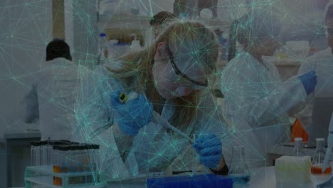 Animation-of-network-of-connections-over-caucasian-female-scientist-in-laboratory