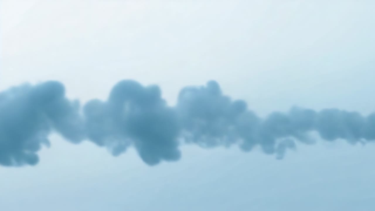 Entering small projectile leaving blue exhaust in pale sky after launch, forming plume