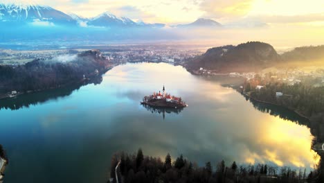 stunning 4k aerial drone video captures lake bled, slovenia, at sunrise