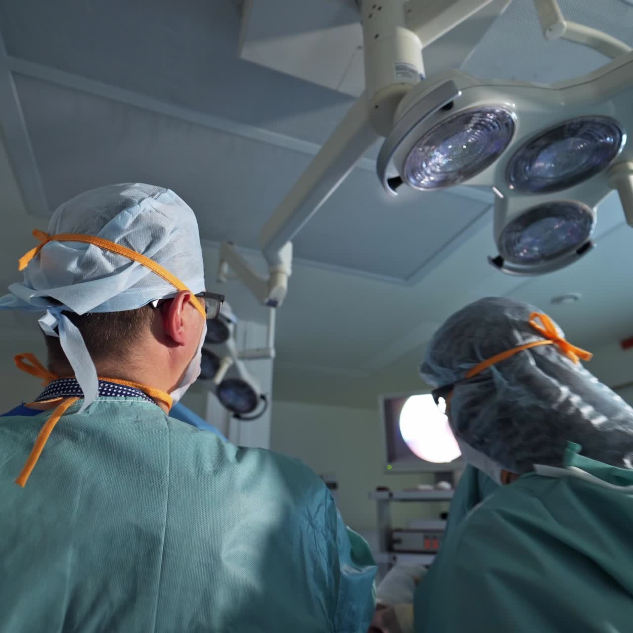 Surgeon professional doctors working in emergency hospital room. Medical specilaists in teamwork