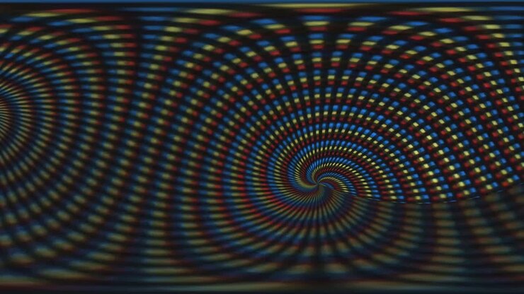 Effetto visivo vivido tipo LSD, astratto e psichedelico su schermo in primo piano.