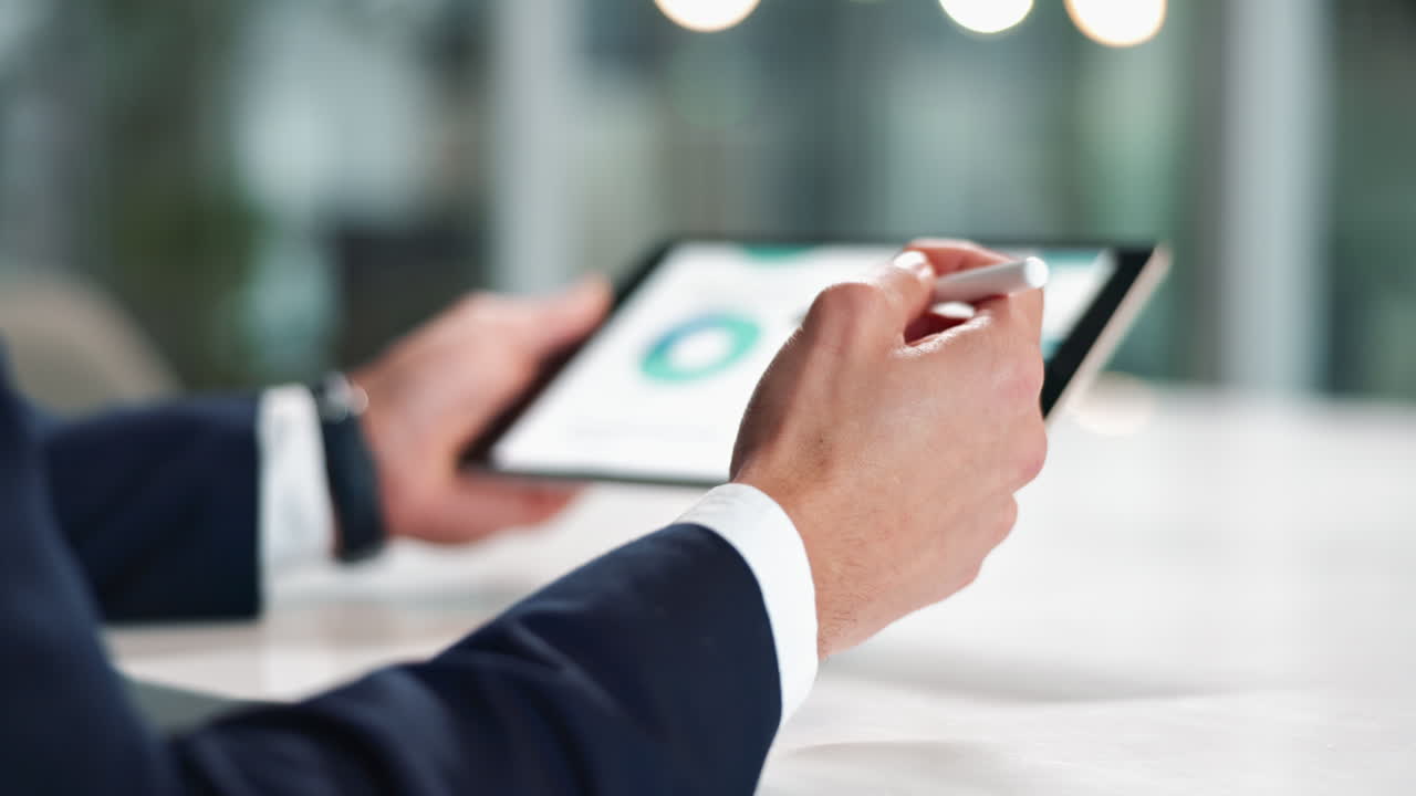 Businessman using tablet with stylus