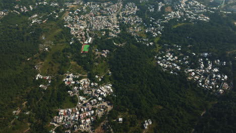 Drone-shot-view-of-crowd-housing-in-Hongkong-city,-China